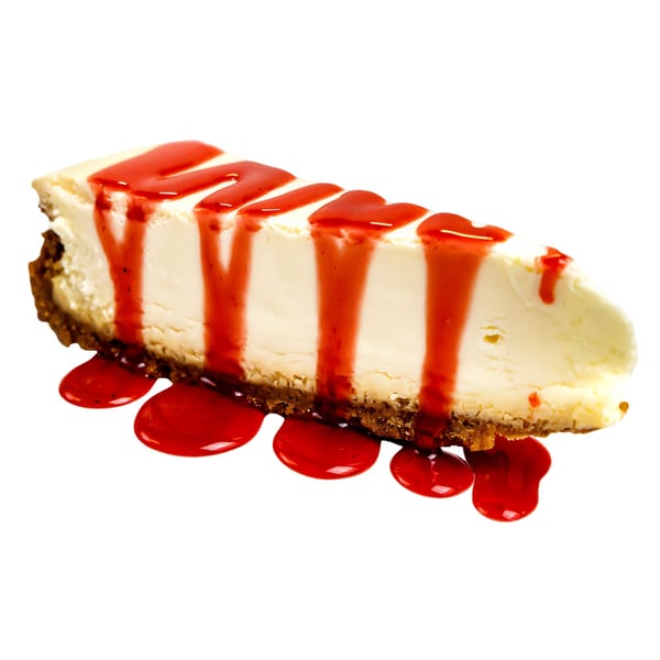 Slice of cheesecake with a graham cracker crust, topped with dripping red strawberry sauce.